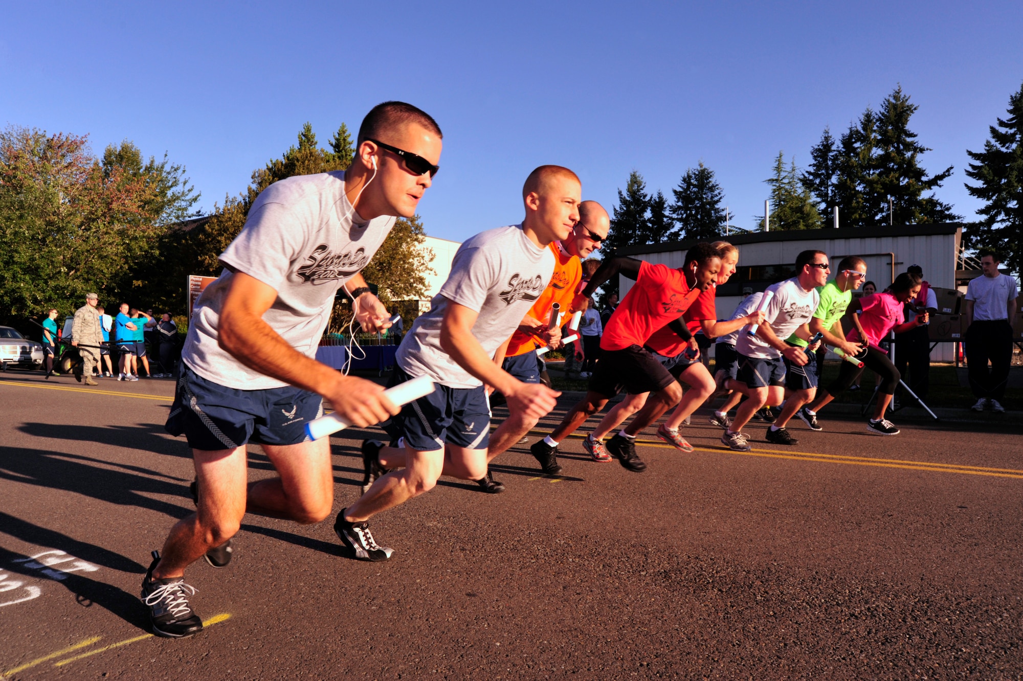 McChord Field Airmen start their run as part of the 5-kilometer relay race during Sports Day Aug. 24, 2012, at Joint Base Lewis-McChord, Wash. The race was one of 10 events. (U.S. Air Force photo/Staff Sgt. Frances Kriss)