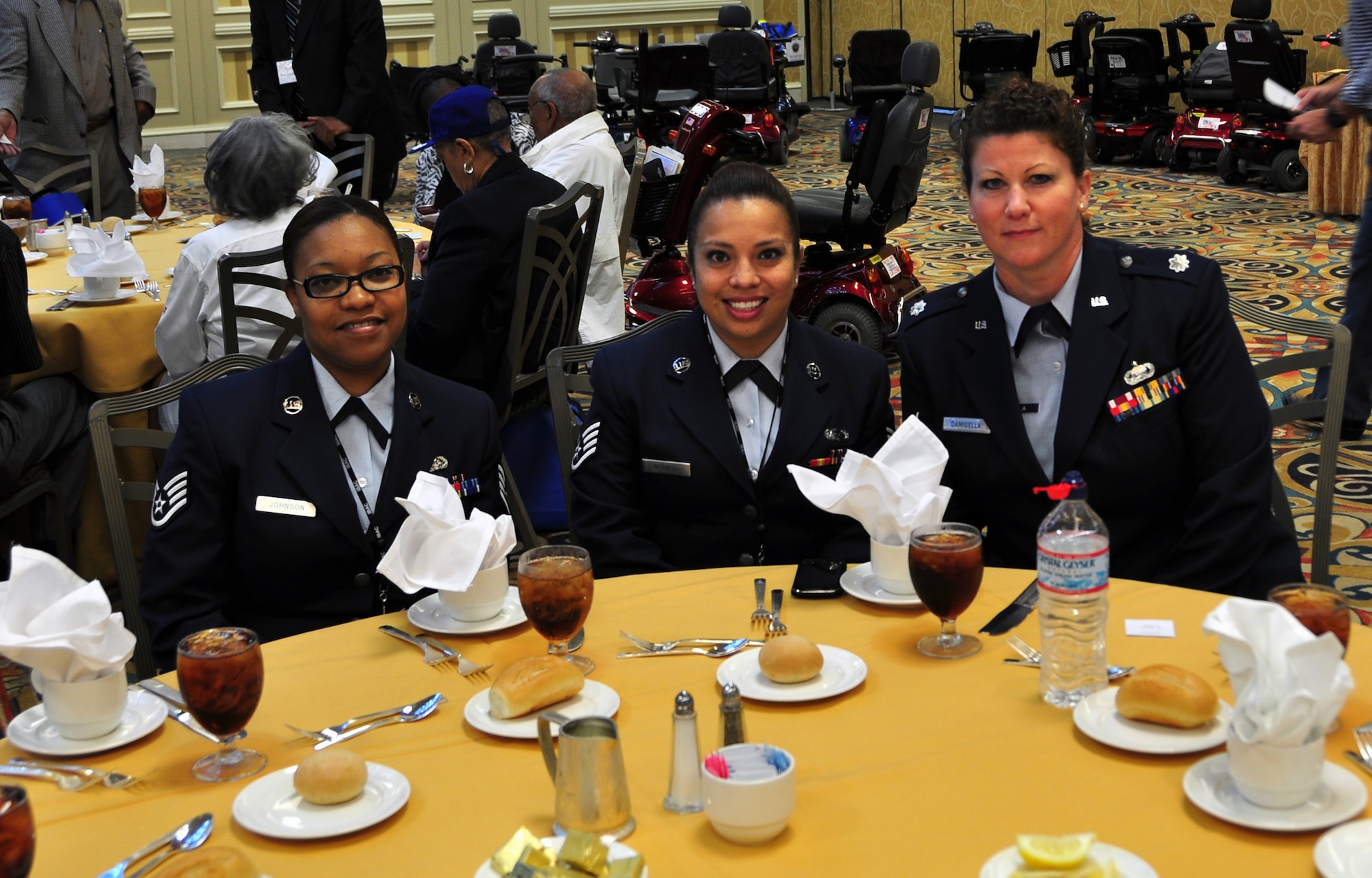 Staff Sgts. Candice Johnson and Dalia Nesmith, both of the 94th Airlift Wing attended the Tuskegee Airmen Inc.’s 2012 national convention in Las Vegas July 31 – Aug. 3. The two Staff Sgts. met Airmen from across the country, such as Lt. Col. Kristin Damigella, 910th Airlift Wing equal opportunity director. (U.S. Air Force photo/Senior Airman Elizabeth Van Patten)
