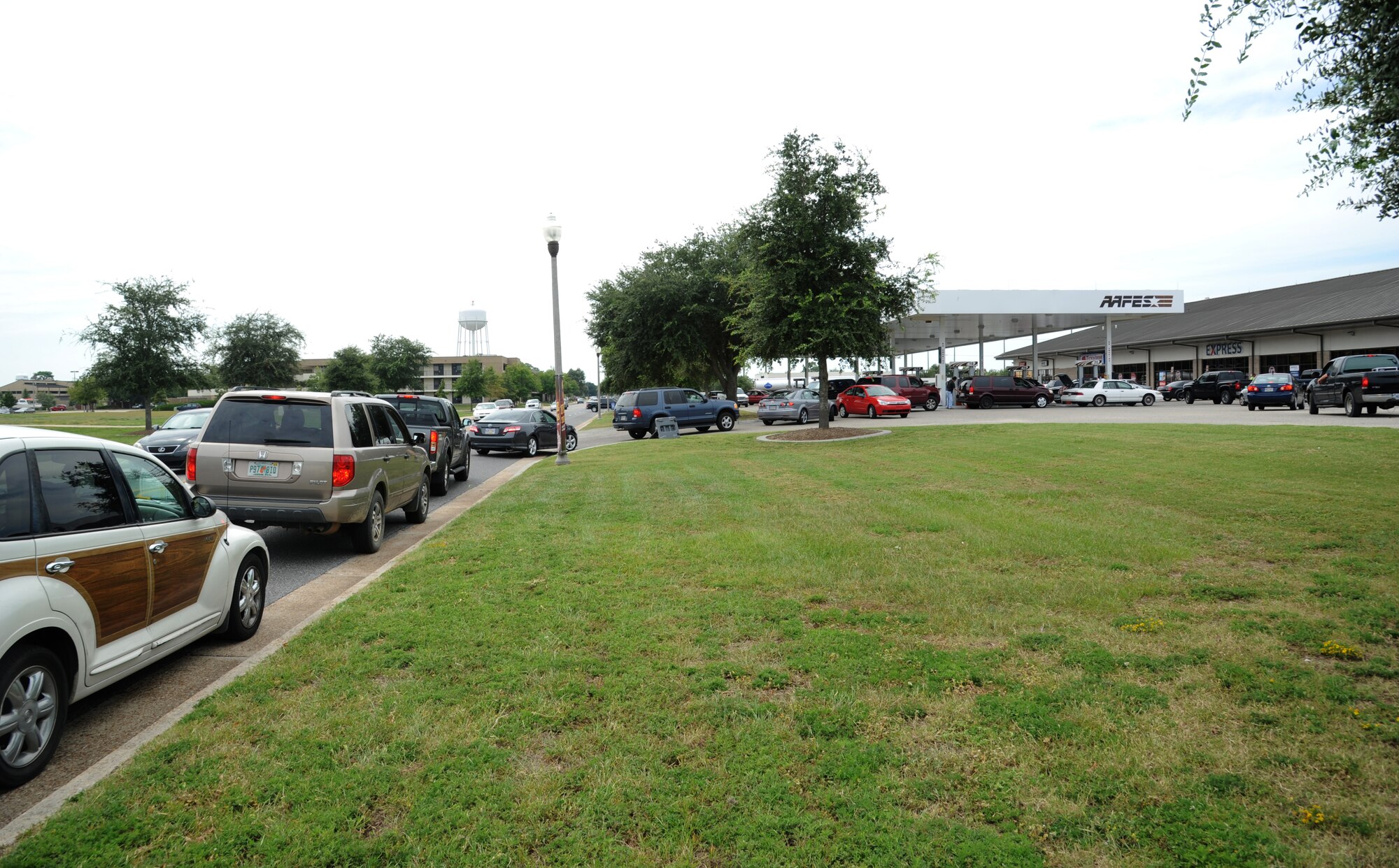 People line up to fuel their vehicles at the Express Aug. 27, 2012, at Keesler Air Force Base, Miss. Keesler personnel are taking preventative measures to prepare and protect themselves and Keesler's assets as the base commander has declared HURCON 3, meaning destructive winds of 58 MPH or greater are expected as Isaac approaches. (U.S. Air Force photo by Kemberly Groue)