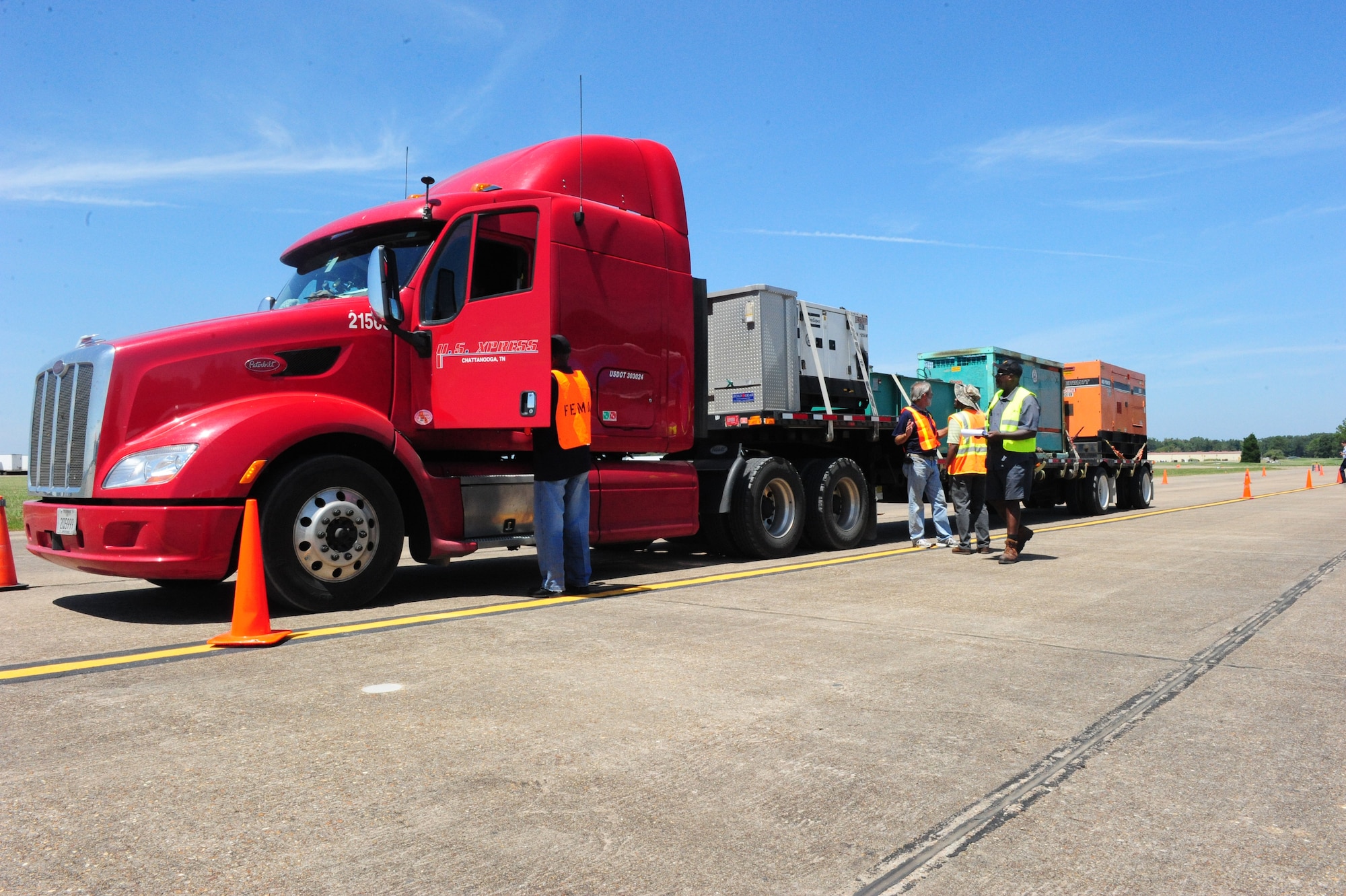 Maxwell Air Force Base hosts Federal Emergency Management Agency trucks and generators waiting to assist areas in the Southeast effected by Tropical Storm Isaac, August 27. Beginning Saturday, more than 120 semi-trucks  filled with water, food, medical equipment, blankets, cots and generators big enough for hospitals began flowing into the base. (U.S. Air Force photo by Master Sgt. Michael Voss)