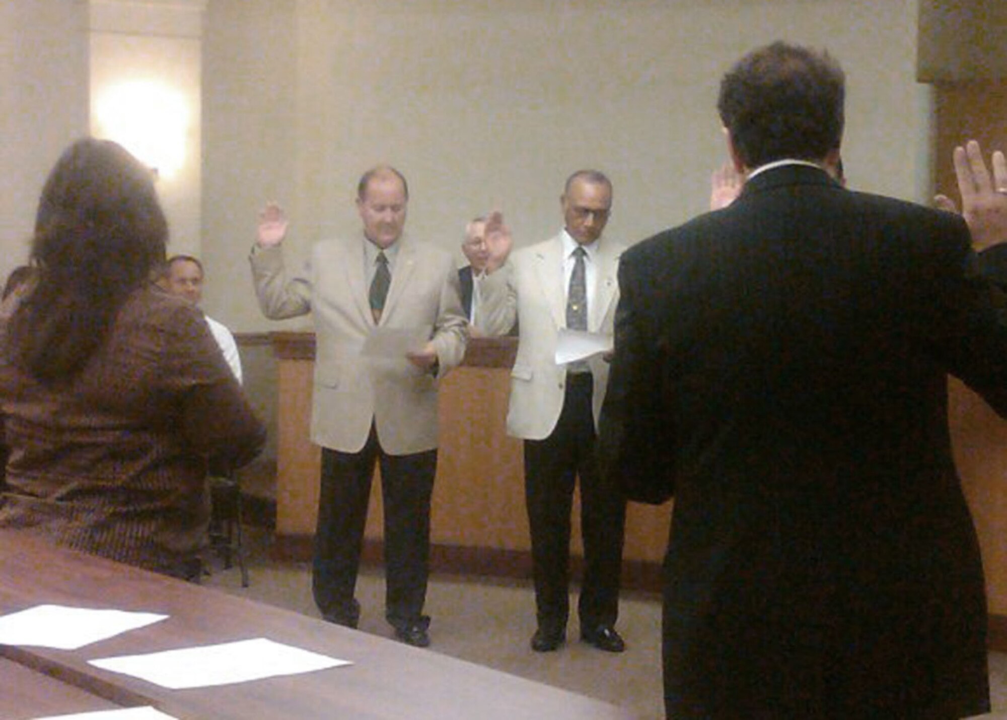 Mr. Jim McPhetres, in civilian status, is sworn in as a city councilman in the City of El Mirage, Ariz. after his 2010 election. (Courtesy Photo) 