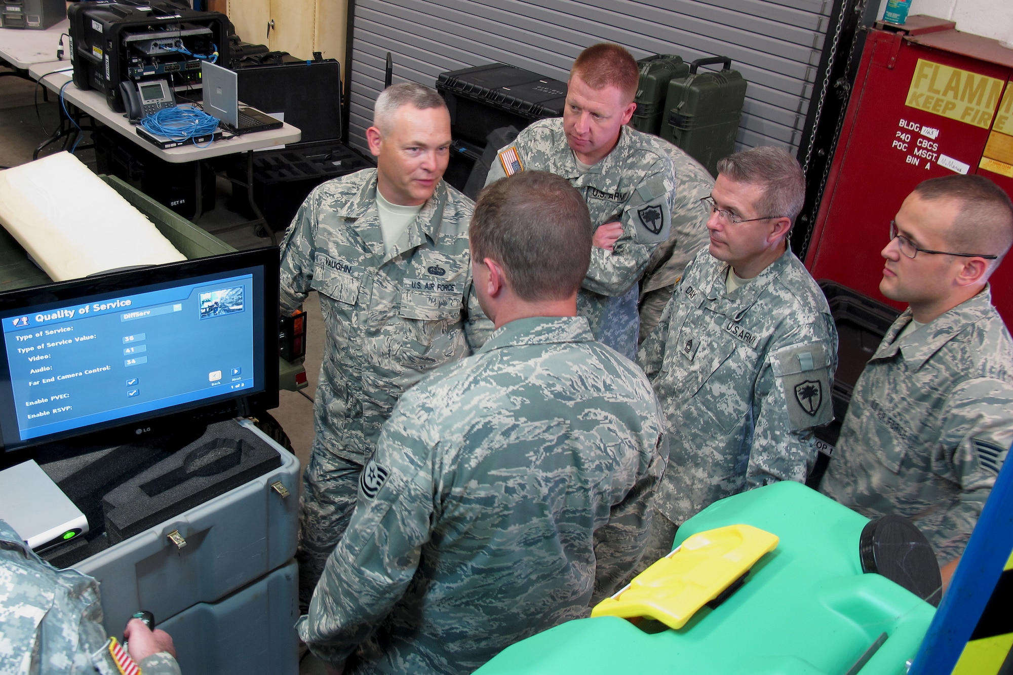 Tech. Sgt. Kevin Vaughn and members of the 169th Communications Flight work with personnel from the S.C. Army National Guard on the latest Joint Incident  Site Communication Capability package delivered to McEntire.