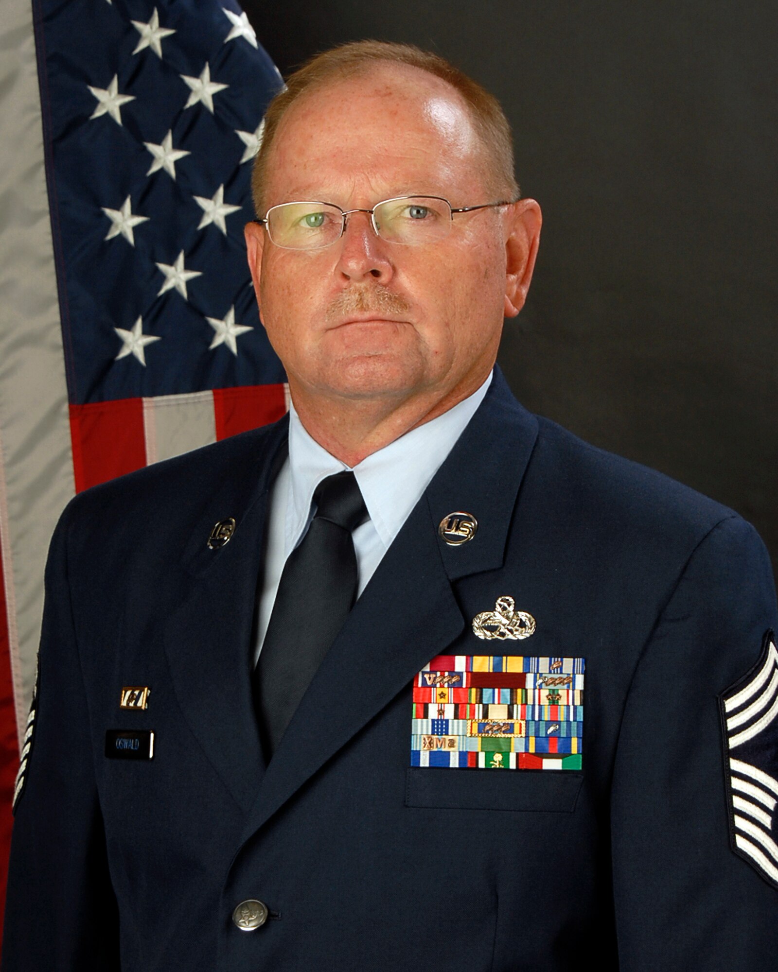 Chief Master Sgt. Russell Oswald with the 169th Aircraft Maintenance Squadron at McEntire Joint National Guard Base, S.C., poses for his portrait to be taken August 1, 2012.
(SCANG photo by Tech. Sgt. Caycee Watson)