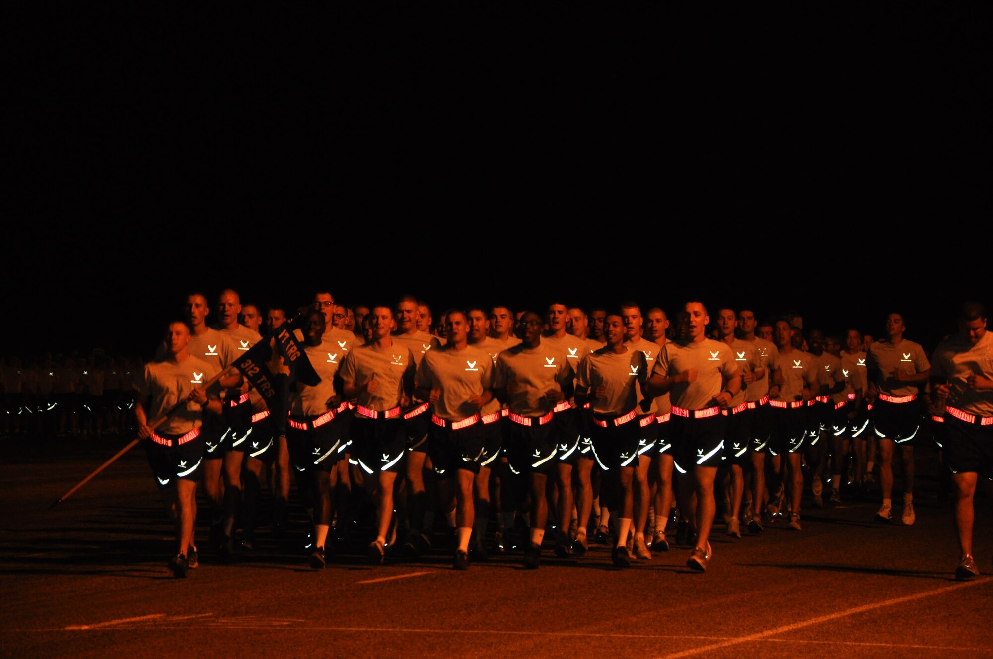 Members from the 312th Training Squadron participate in the Goodfellow Wing Run Aug. 24 here. All active duty members from the base were asked to join in on the run. (Air Force Photo/ Airman 1st Class Erica Flores)