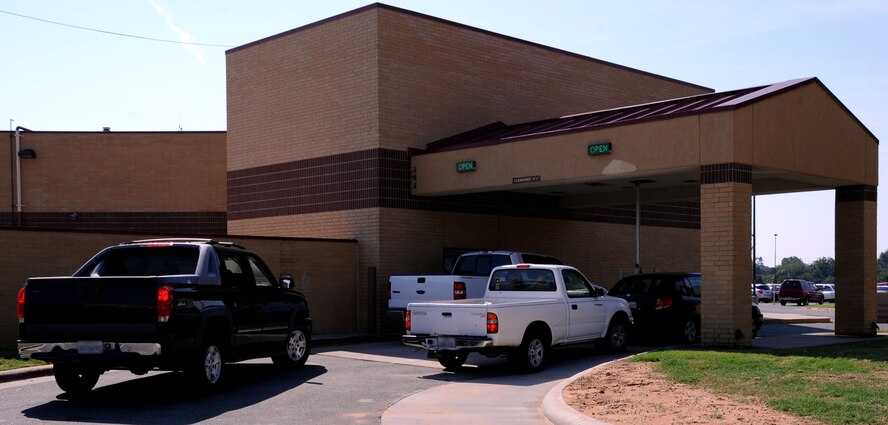 Patrons drive into the newly renovated two lane satellite pharmacy drive-through on Barksdale Air Force Base, La., Aug. 23. The drive-through was extended to allow two cars to be processed through the line at the same time, making the wait shorter for patrons picking up prescriptions. (U.S. Air Force photo/Senior Airman La?Shanette V. Garrett)(RELEASED)