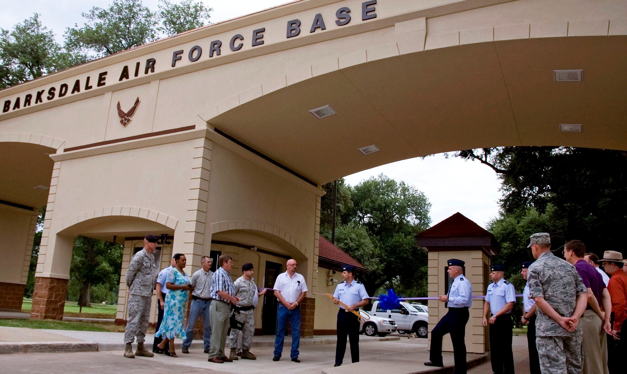Col. Andrew Gebara, 2nd Bomb Wing commander, thanks construction workers before the ribbon cutting of the re-opening of the West Gate on Barksdale Air Force Base, La., Aug. 27. The $415,000 project finished a week ahead of schedule after being under renovation since late April. (U.S. Air Force photo/Senior Airman La?Shanette V. Garrett)(RELEASED) 

