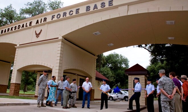 Col. Andrew Gebara, 2nd Bomb Wing commander, thanks construction workers before the ribbon cutting of the re-opening of the West Gate on Barksdale Air Force Base, La., Aug. 27. The $415,000 project finished a week ahead of schedule after being under renovation since late April. (U.S. Air Force photo/Senior Airman La?Shanette V. Garrett)(RELEASED) 