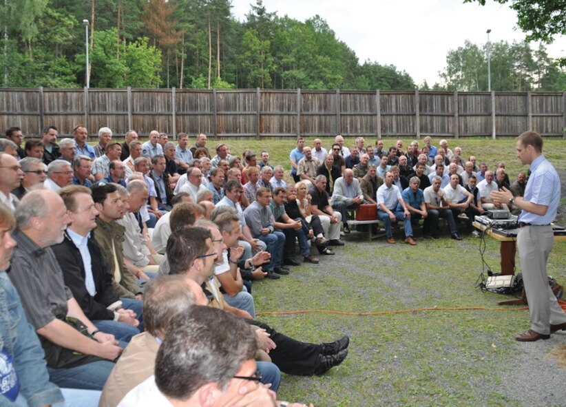 Special Agent Chris Scheib answers questions from Bavarian police officials concerning the joint United States-German investigation of the Frankfurt International Airport shooting. Due in large part to the investigative efforts by Air Force Office of Special Investigations agents in Germany, the terrorist responsible for the shooting was convicted to life in prison by a German three-judge panel. (U.S. Air Force photo provided by 5 FIS.)