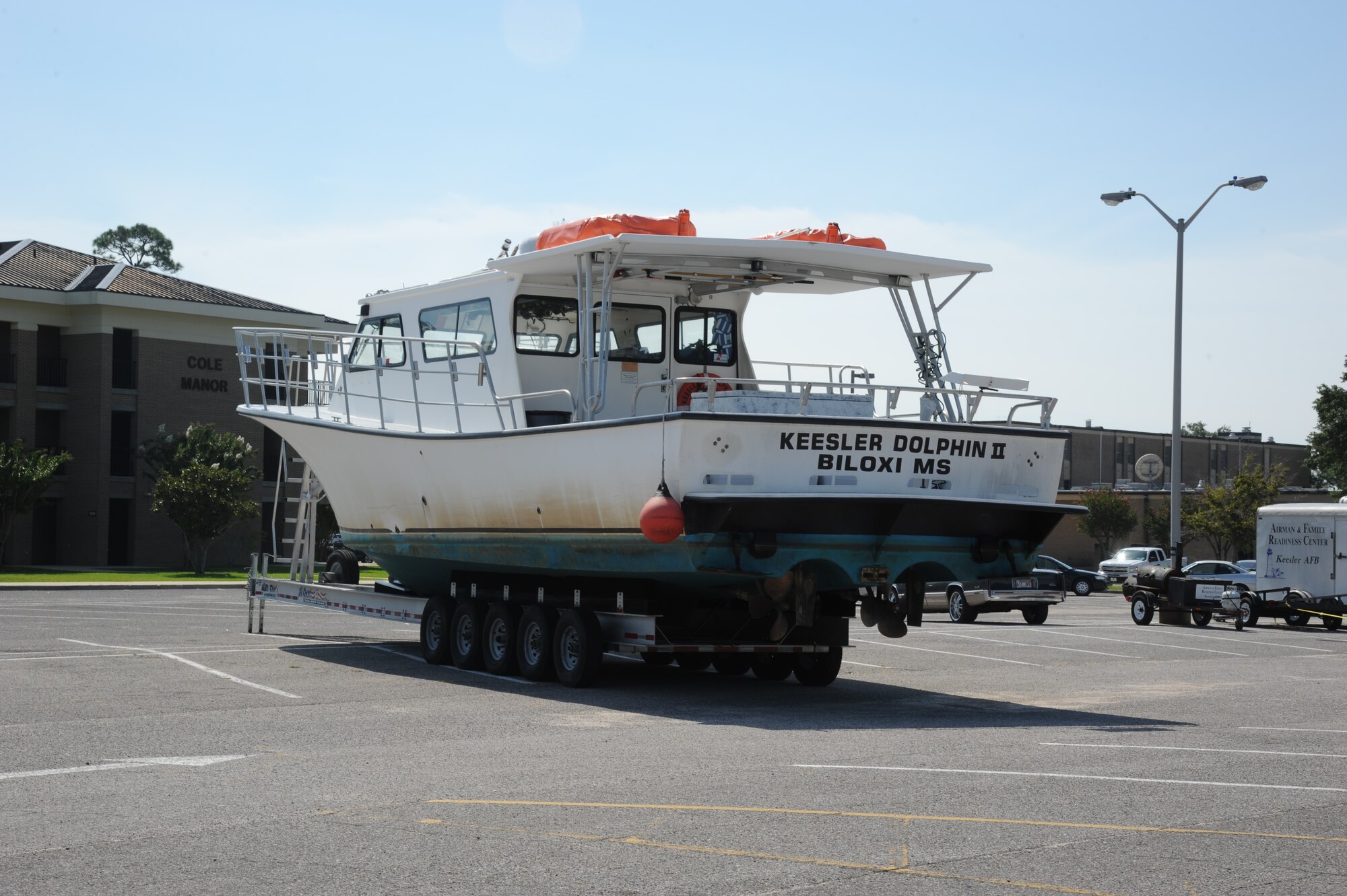 The Keesler Dolphin II is moved to safe ground in a parking lot Aug. 27, 2012, as Keesler personnel are taking preventative measures to prepare and protect themselves and Keesler's assets as the base commander has declared HURCON 3, meaning destructive winds of 58 MPH or greater are expected as Isaac approaches. (U.S. Air Force photo by Kemberly Groue)