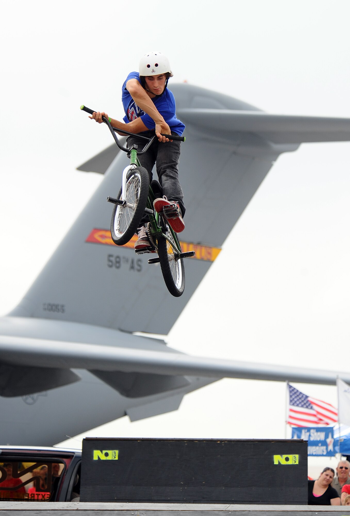 No Wear BMX cyclist Sam Bussell catches some air while performing at the 2012 Defenders of Freedom Open House and Air Show held at Offutt Air Force Base, Neb., Aug. 26.  No Wear was one of the new vendors at the Air Show.  (U.S. Air Force Photo by Josh Plueger/Released)
