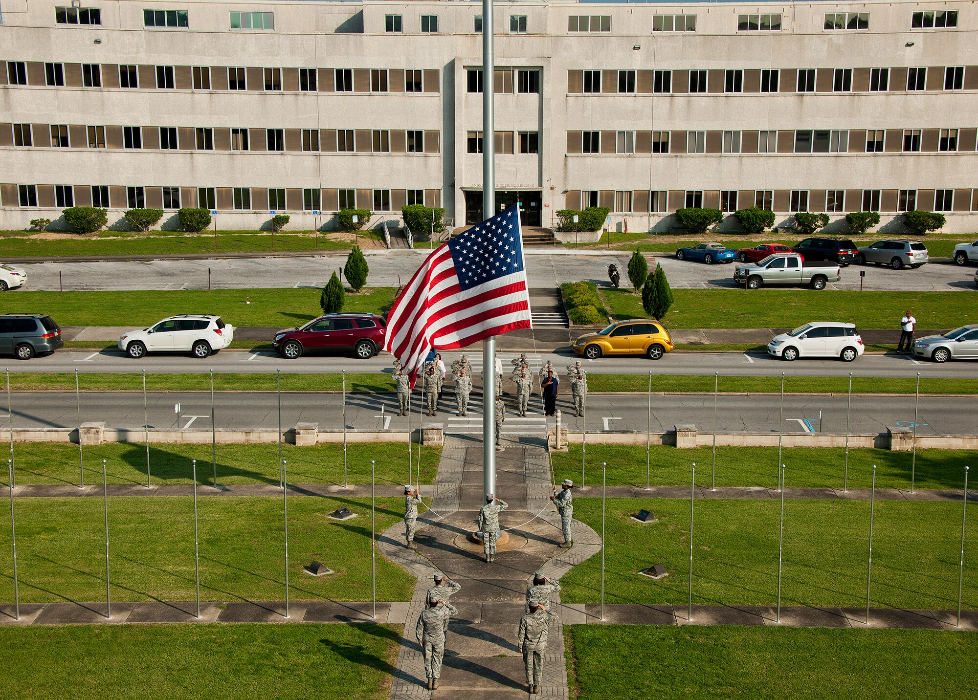 An all-female flight and flag detail perform the retreat ceremony in honor of Women’s Equality Day at Eglin Air Force Base, Fla., Aug 23. More than 20 women participated in the ceremony.  (U.S. Air Force photo/Samuel King Jr.)