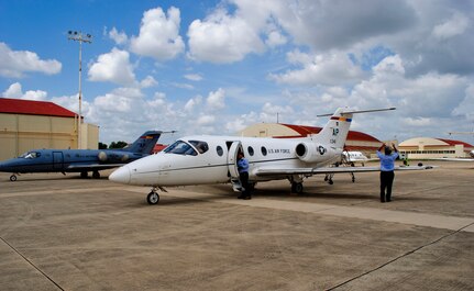 T-1 Jayhawks from the 479th Flying Training Group arrive at the south ramp at Joint Base San Antonio-Randolph, Texas, Aug. 27.  Thirty-four aircraft and 60 accompanying aircrew members were evacuated from their home station, Naval Air Station Pensacola, Fla., in anticipation of Hurricane Isaac.  The 479th FTG is a geographically separated unit of the 12th Flying Training Wing and conducts the Air Force's only Combat Systems Officer training program. (U.S. Air Force photo by Bekah Clark)