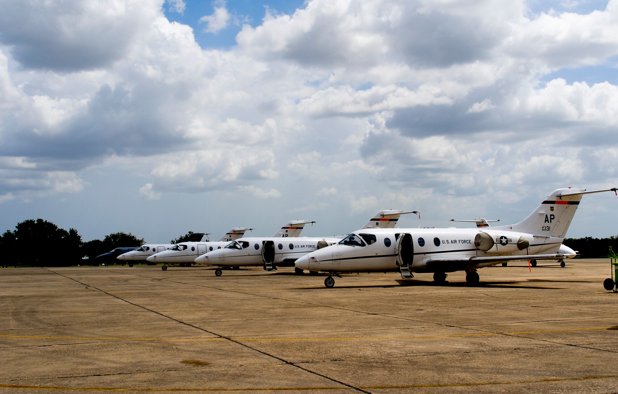 T-1 Jayhawks from the 479th Flying Training Group line the south ramp at Joint Base San Antonio-Randolph, Texas, Aug. 27.  Thirty-four aircraft and 60 accompanying aircrew members were evacuated from their home station, Naval Air Station Pensacola, Fla., in anticipation of Hurricane Isaac.  The 479th FTG is a geographically separated unit of the 12th Flying Training Wing and conducts the Air Force's only Combat Systems Officer training program. (U.S. Air Force photo by Bekah Clark)