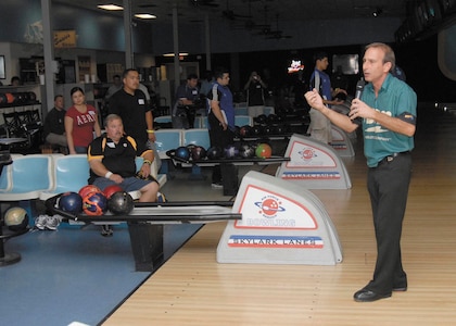 Pro Bowlers Association hall of famer Norm Duke talks to participants during last year’s seminar and clinic. This year, PBA superstars Brian Voss, Robert Smith, Michael Haugen Jr., and Missy Parkin will conduct a clinic and play with Pro-Am bowlers from Joint Base San Antonio-Lackland, JBSA-Randolph, and University Bowl. (U.S. Air Force photo/Alan Boedeker)