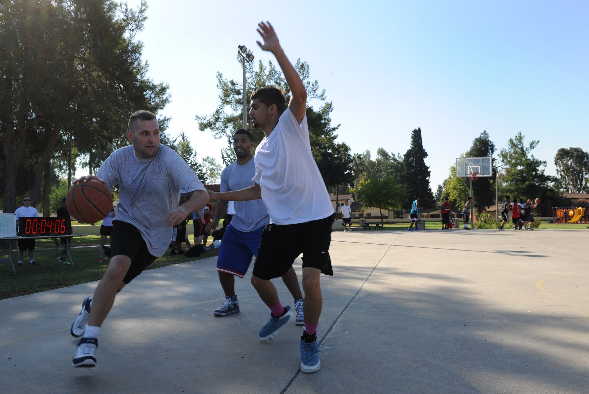 Airmen of Team Incirlik participate in the Airman Leadership School Olympics Aug. 24, 2012, at Incirlik Air Base, Turkey. The event began with a 2.2 mile run, followed by 3-on-3 basketball and volleyball tournaments. (U.S. Air Force photo by Senior Airman Anthony Sanchelli/Released)

