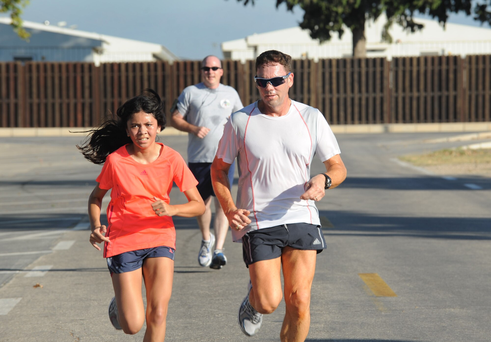 Airmen of Team Incirlik participate in the Airman Leadership School Olympics Aug. 24, 2012, at Incirlik Air Base, Turkey. The event began with a 2.2 mile run, followed by 3-on-3 basketball and volleyball tournaments. (U.S. Air Force photo by Senior Airman Anthony Sanchelli/Released)

