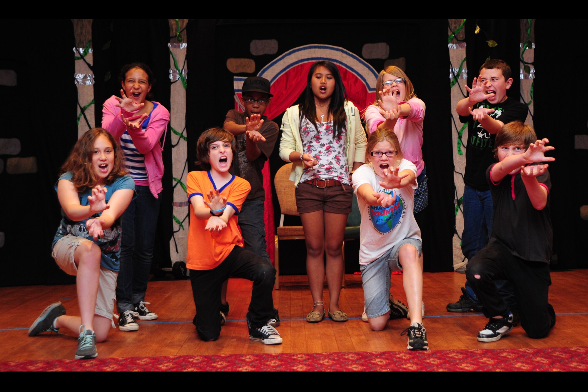 RAF MENWITH HILL, United Kingdom - Fifty-four children from the Menwith Hill community, throughout the Menwith Hill Station Youth Programs, took part in the performance of the play, “The Frog Prince,” Aug. 9 in the club ballroom. The play, which was put on by The Missoula Children’s Theater, was a culmination of a week of hard work and rehearsal for everyone involved. The theatre comes to base every summer to mesmerize a new batch of young actors and actresses. (U.S. Air Force photos by Staff Sgt. Debbie Lockhart)