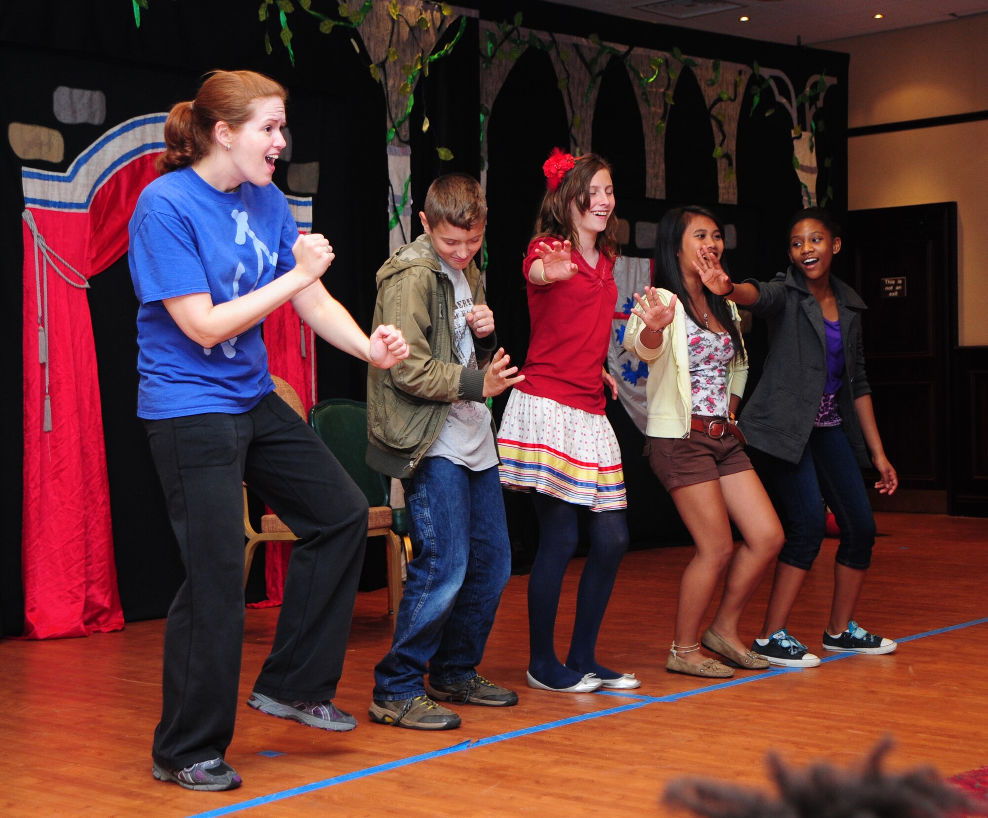 RAF MENWITH HILL, United Kingdom - Fifty-four children from the Menwith Hill community, throughout the Menwith Hill Station Youth Programs, took part in the performance of the play, “The Frog Prince,” Aug. 9 in the club ballroom. The play, which was put on by The Missoula Children’s Theater, was a culmination of a week of hard work and rehearsal for everyone involved. The theatre comes to base every summer to mesmerize a new batch of young actors and actresses. (U.S. Air Force photos by Staff Sgt. Debbie Lockhart)