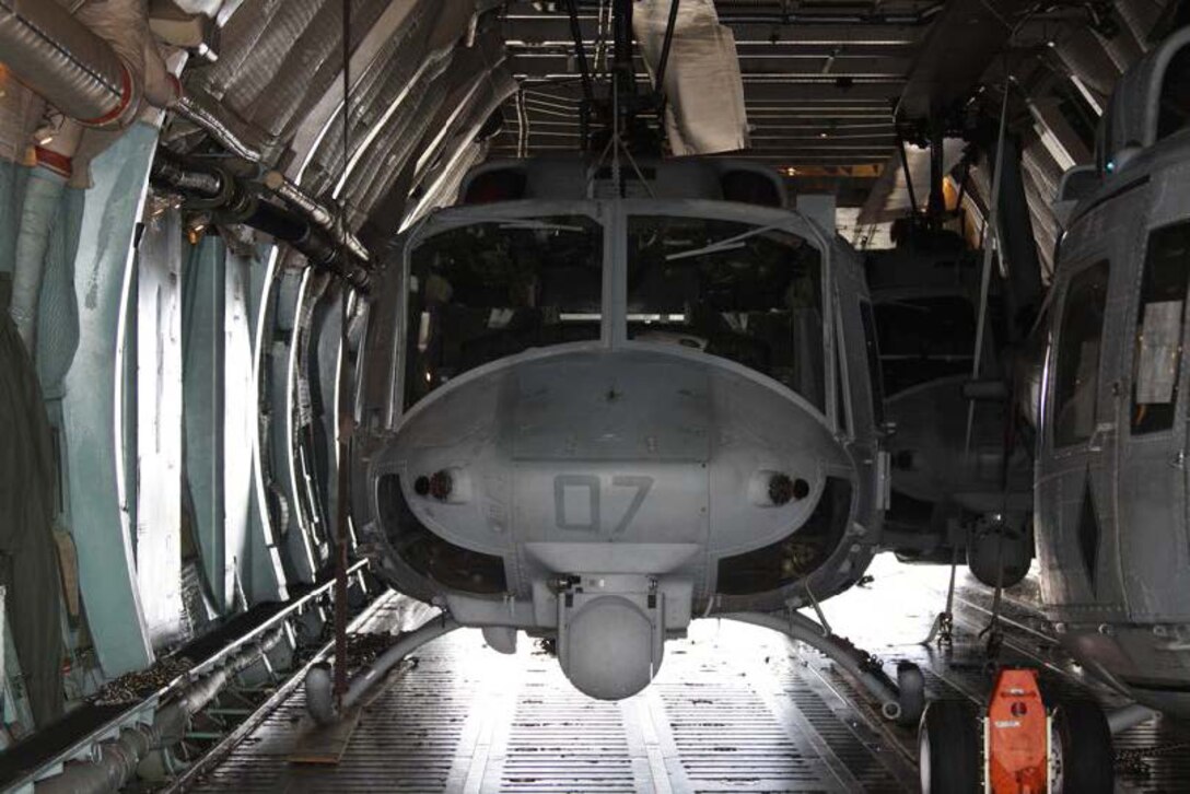 GUATEMALA CITY— Four UH-1N Huey helicopters embarked aboard a U. S. Air Force Reserve C-5 Galaxy are being used in support of Operation Martillo.  The aircraft from Marine Light Attack Helicopter Squadron 467 are assigned to Marine Aircraft Group 29, 2nd Marine Aircraft Wing based in Cherry Point, N.C.  The crews and aircraft of HMLA-467 are attached to U.S. Marine Corps Forces, South for the duration of the operation and will be used for detection and monitoring.  Detachment Martillo, under operational control of U.S. Marine Corps Forces, South, is comprised of a number of units from II Marine Expeditionary Force.  Operation Martillo is an operation led by Joint-Interagency Task Force-South, of the U.S. Southern Command, and is designed to help stem the flow of narcotics through Central America and its Pacific and Caribbean coasts by denying transnational criminal organizations littorals used for illicit trafficking.  (Official U.S. Marine Corps photo//Released)