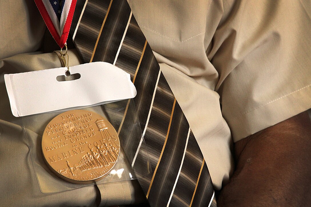 ORANGE CITY, Fla.,(August 25, 2012)—“For outstanding perseverance and courage that inspired social change in the Marine Corps,” is inscribed on the Congressional Gold Medal given to all Original Montford Point Marines for their service to the nation at a time when racial discrimination was commonplace and the services were just beginning to desegregate. 
Mr. Robert Blanks, an Original Montford Point Marine, received his Congressional Gold Medal in a ceremony held at his residence. Blanks, 85, who enlisted into the Marine Corps during World War II from Bronx, N.Y., welcomed the award in recognition of his service to the nation.
The Congressional Gold Medal is the nation’s highest civilian honor given by congress for distinguished achievement. The President of the United States signed into law the legislation to award the medal to the Montford Point Marines on November 23, 2011. (Official USMC photo by Staff Sgt. Tracie G. Kessler)(Released).