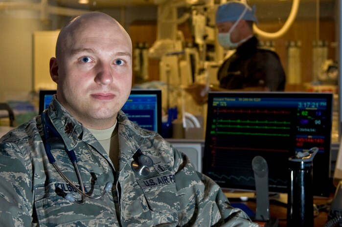 Maj. Jeremy Kilburn, a cardio pulmonary physician at the Mike O'Callaghan Federal Medical Center, oversees a cardio-pulmonary procedure Aug. 28, 2012, at Nellis Air Force Base, Nev. He recently won the Red Cross Everyday Heroes award for his July 9, 2012, life-saving efforts. (U.S. Air Force photo by Senior Airman Daniel Hughes/Released)