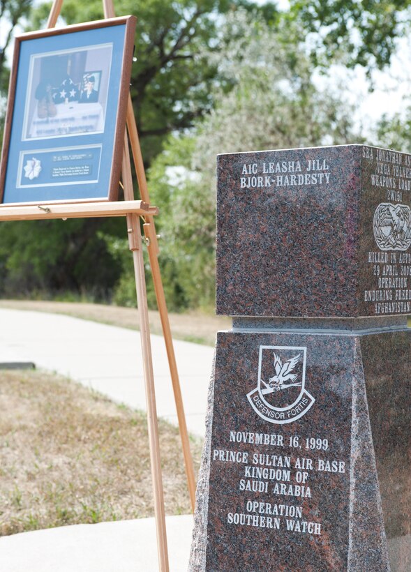 A memorial bearing the name of Airman 1st Class Leasha Jill Bjork-Hardesty is unveiled along the Memorial Park walkway at Ellsworth Air Force Base, S.D., Aug. 27, 2012. The walkway includes memorials representing the men and women assigned to Ellsworth who have died while on duty. (U.S. Air Force photo by Airman 1st Class Alystria Maurer/Released)