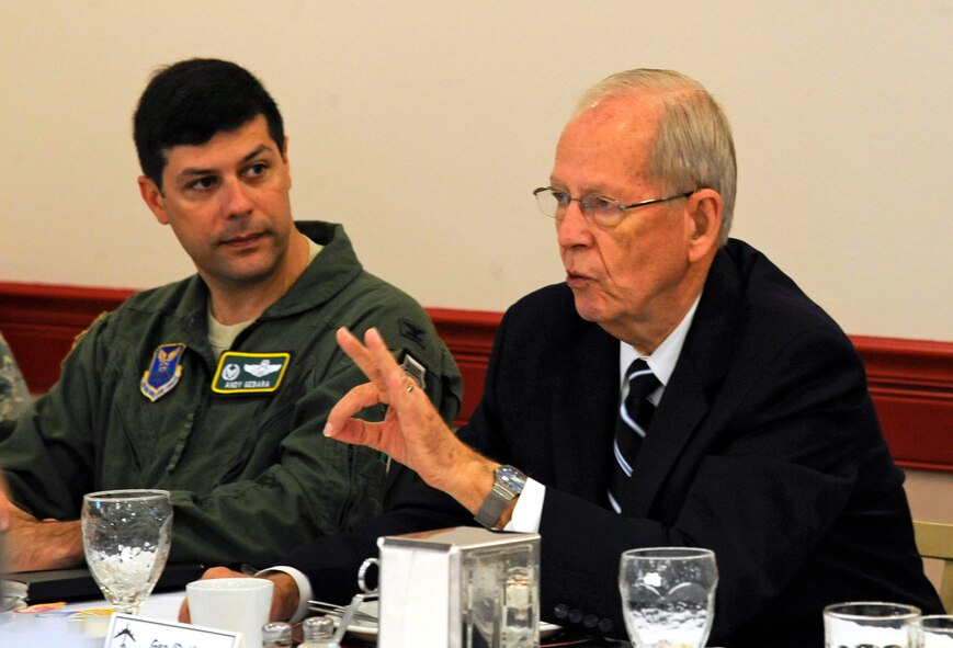Retired Air Force General Larry Welch, 12th Chief of Staff of the Air Force, speaks at the Defense Science Board breakfast as Col. Andrew Gebara, 2nd Bomb Wing commander, listens at Barksdale Air Force Base, La., Aug 28. Welch attended the breakfast to meet with Airmen and discuss work-related issues and possible solutions. (U.S. Air Force photo/Airman 1st Class Andrew Moua)(RELEASED)