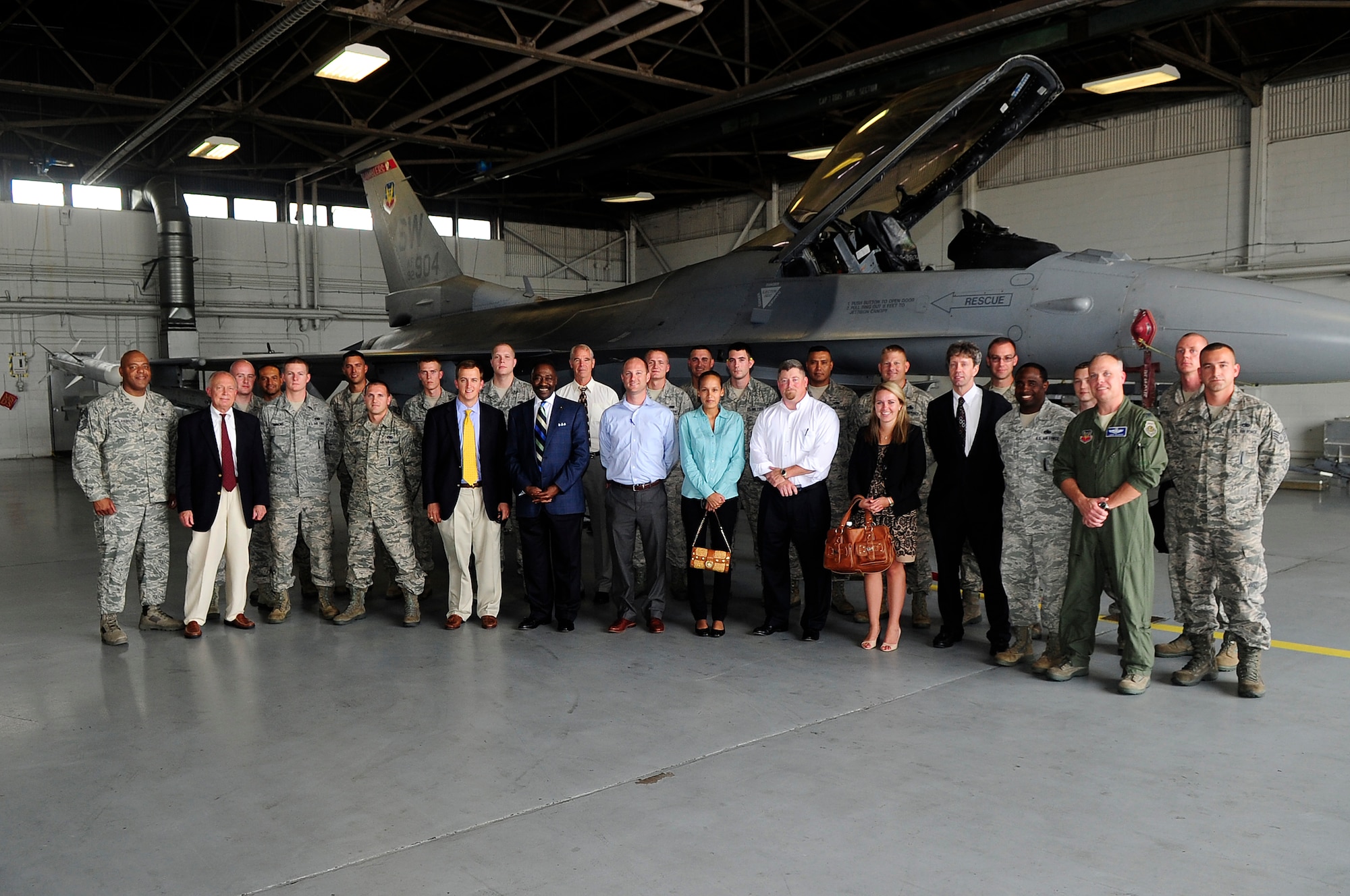 South Carolina Congressional staff members pose for a group photo at Shaw Air Force Base, S.C., Aug. 21, 2012. More than ten staffers and local civic leaders spent the day learning about the 20th Fighter Wing, 9th Air Force, U.S. Air Forces Central and Third Army/U.S. Army Central missions. (U.S. Air Force photo by Airman 1st Class Hunter Brady/Released)