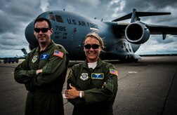 Master Sgt. Erin Manley, 14th Airlift Squadron, 437th Airlift Wing loadmaster instructor, and Lt. Col. Kenneth Norris with the 437th Operations Support Squadron, stand in front of a C-17 Globemaster III Aug. 27, 2012, at Joint Base Charleston – Air Base, S.C. Manley and Norris both recently returned from a 365-day tour in Kabul, Afghanistan. Manley was tasked with training Afghan military members from the newly formed Afghan air force to become loadmasters. Norris filled the position of 438th Air Expeditionary Advisory Group deputy commander, where he oversaw several squadrons including the squadron Manley served in, the 538th Air Expeditionary Advisory Squadron. (U.S. Air Force photo by Senior Airman Dennis Sloan)