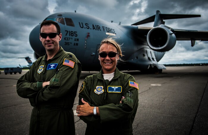 Master Sgt. Erin Manley, 14th Airlift Squadron, 437th Airlift Wing loadmaster instructor, and Lt. Col. Kenneth Norris with the 437th Operations Support Squadron, stand in front of a C-17 Globemaster III Aug. 27, 2012, at Joint Base Charleston – Air Base, S.C. Manley and Norris both recently returned from a 365-day tour in Kabul, Afghanistan. Manley was tasked with training Afghan military members from the newly formed Afghan air force to become loadmasters. Norris filled the position of 438th Air Expeditionary Advisory Group deputy commander, where he oversaw several squadrons including the squadron Manley served in, the 538th Air Expeditionary Advisory Squadron. (U.S. Air Force photo by Senior Airman Dennis Sloan)