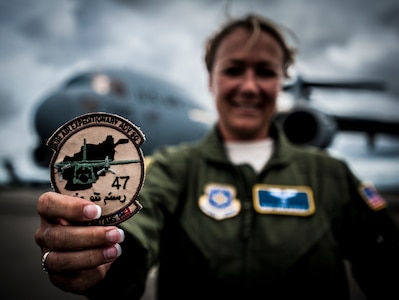 Master Sgt. Erin Manley, 14th Airlift Squadron, 437th Airlift Wing loadmaster instructor, displays her desert patch Aug. 27, 2012, at Joint Base Charleston – Air Base, S.C. Manley was assigned to the 538th Air Expeditionary Advisory Squadron in Kabul, Afghanistan, July 2011 for a 365-day tour. Manley was tasked with training Afghan military members from the newly formed Afghan air force to become loadmasters. (U.S. Air Force photo by Senior Airman Dennis Sloan)