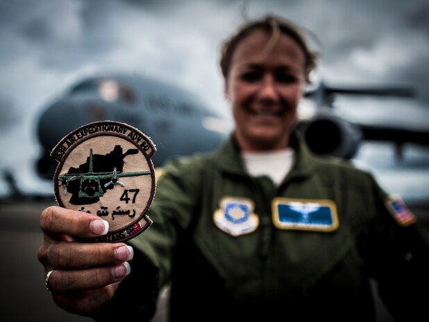 Master Sgt. Erin Manley, 14th Airlift Squadron, 437th Airlift Wing loadmaster instructor, displays her desert patch Aug. 27, 2012, at Joint Base Charleston – Air Base, S.C. Manley was assigned to the 538th Air Expeditionary Advisory Squadron in Kabul, Afghanistan, July 2011 for a 365-day tour. Manley was tasked with training Afghan military members from the newly formed Afghan air force to become loadmasters. (U.S. Air Force photo by Senior Airman Dennis Sloan)