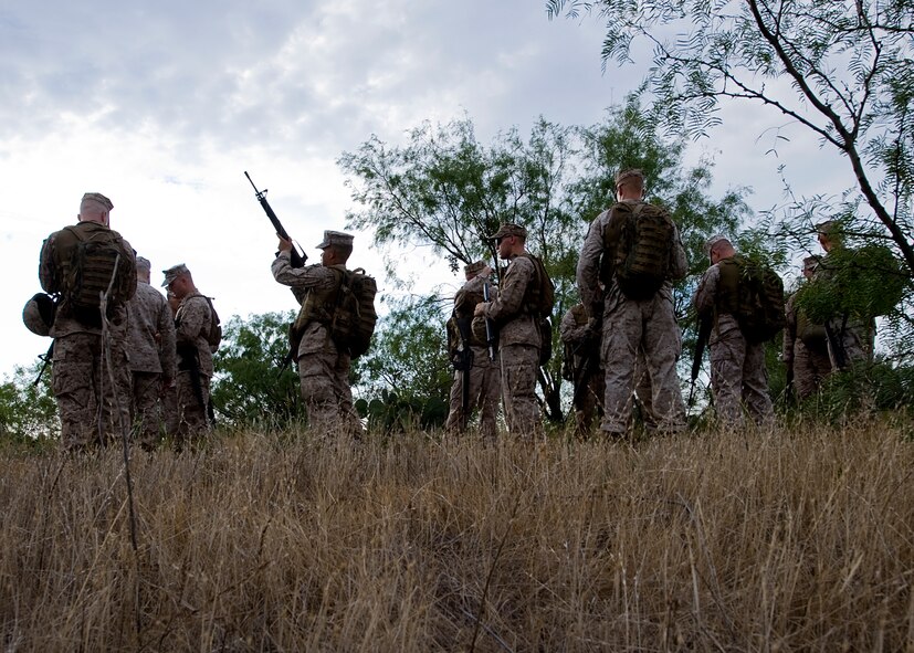 Marines take part in the operations culminating portion of the Corporal’s Course Aug. 24, 2012, at Dyess Air Force Base, Texas. The Corporals Course is a two-week program focused on providing the skills necessary to lead Marines and is designed to provide the war fighting skill, core values and mindset necessary for effective leadership of a team and subordinate Marines. Upon completion, corporals have the skills necessary to clearly articulate one’s thoughts in both oral and written communications; understand the standards of leadership traits, principles and fundamentals; understand the NCO mindset of "doing instead of knowing;" and execute and apply tactical measures at the team level. (U.S. Air Force photo by Airman 1st Class Damon Kasberg/Released)