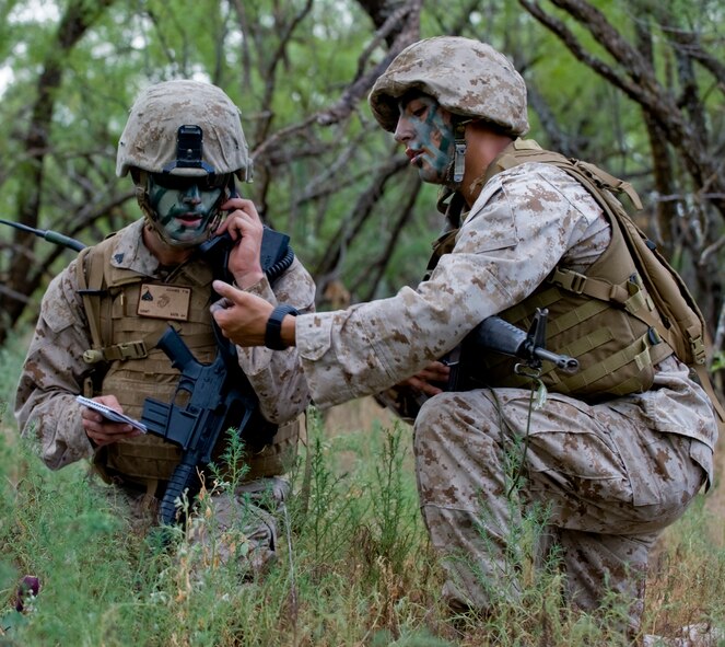 Marine Corporals Course students, relay information during the final exercise of the Corporals Course Aug. 24, 2012, at Dyess Air Force Base, Texas. The final exercise is a culmination of everything the Marines have learned throughout their 15-day Corporals Course. (U.S. Air Force photo by Airman 1st Class Charles V. Rivezzo/ Released)