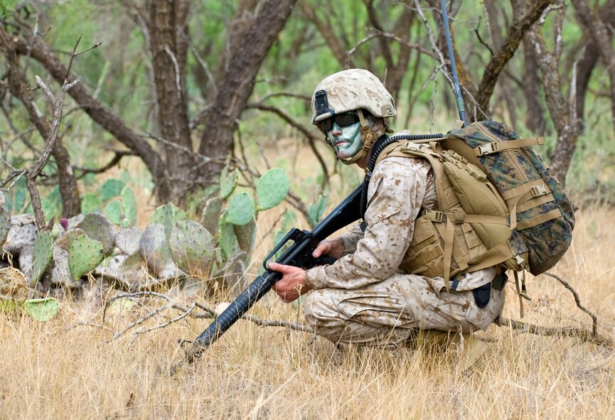 U.S. Marine Cpl. Thomas M. Adams, Corporals Course student, participates in the final exercise of the Corporals Course Aug. 24, 2012, at Dyess Air Force base, Texas. The final exercise is a culmination of everything the Marines have learned throughout their 15-day Corporals Course. (U.S. Air Force photo by Airman 1st Class Charles V. Rivezzo/ Released)