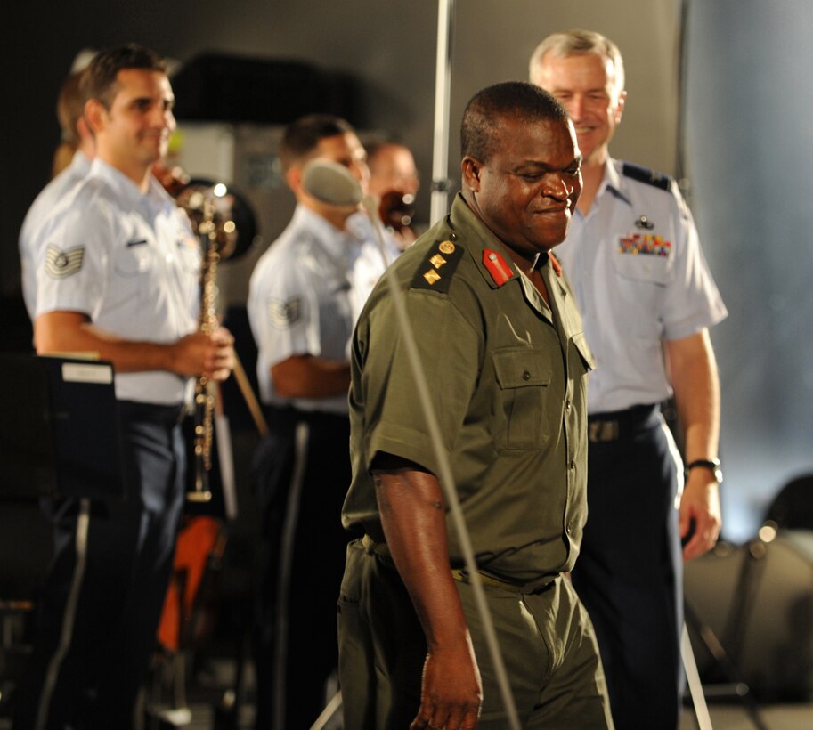 Col. Sampson Paa-Kwesi Ebonyi, director of music and bands of Ghana Armed Forces, finished conducting his last song to the U.S. Air Force band as they played for bystanders at the Air Force Memorial on August 24, 2012 in Washington D.C. The USAF band hosts this concert every Tuesday from June 5-August 28.  (U.S. Air Force photo by Senior Airman Christina Brownlow)
