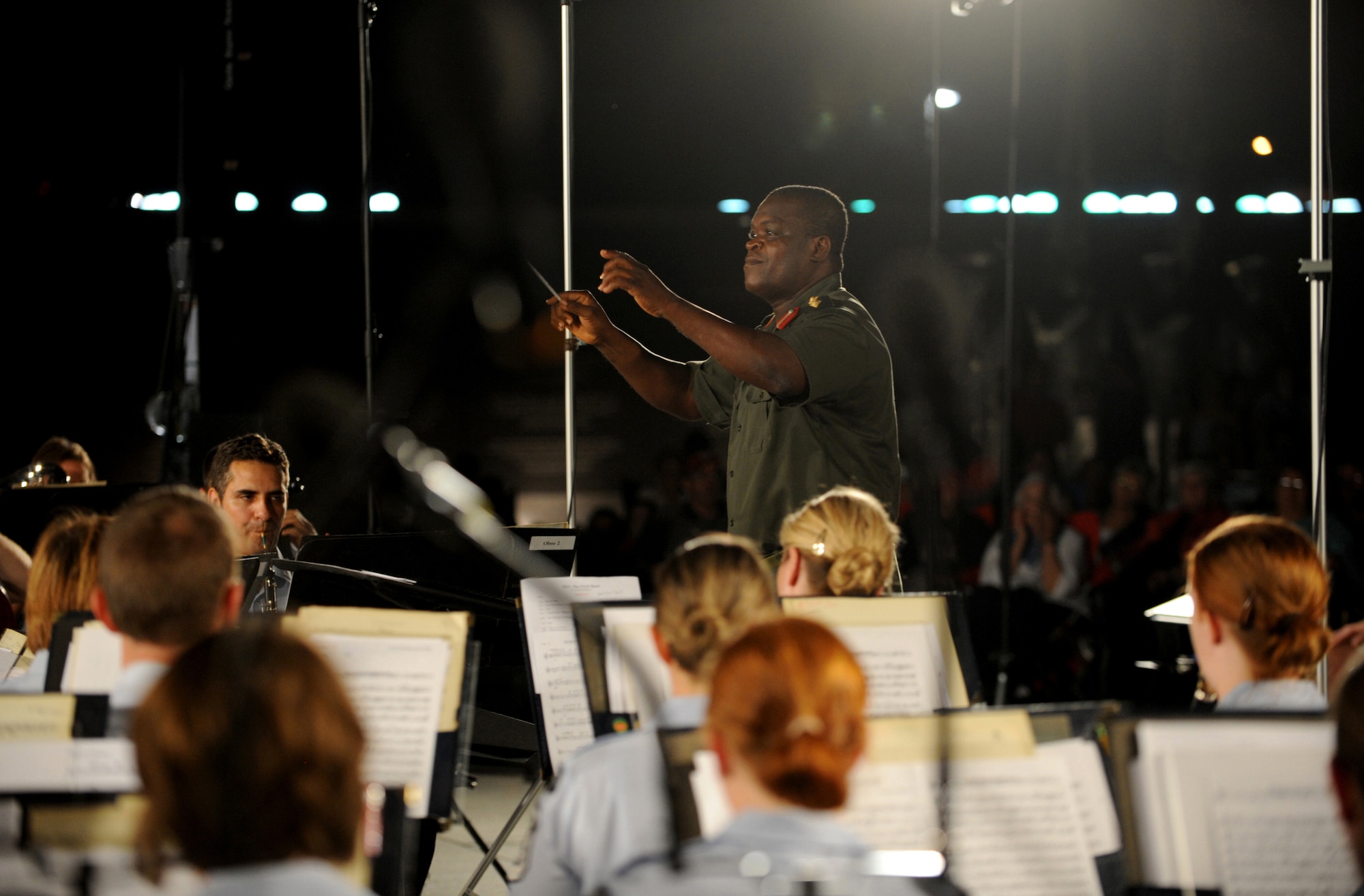 Col. Sampson Paa-Kwesi Ebonyi, director of music and bands of the Ghana armed forces, was a guest conductor for the U.S. Air Force Band as they played for bystanders at the Air Force Memorial on August 24, 2012 in Washington D.C. The USAF band hosts this concert every Tuesday from June 5-August 28, 2012. (U.S. Air Force photo by Senior Airman Christina Brownlow)