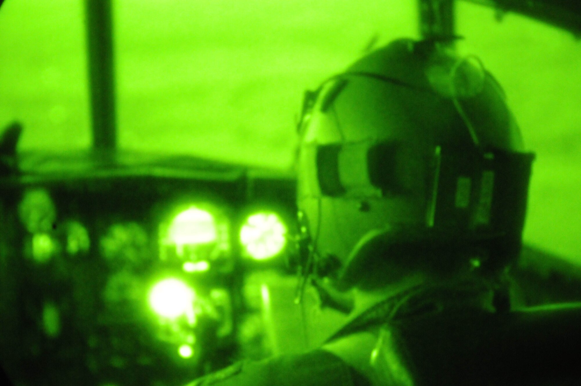 Lt. Col. John Patterson C-130 pilot for the 107th Airlift Wing, trains using the night vision goggles. Pilots from the Niagara Reserve Station fly local training mission for future deployments that may require night operations. (U.S. Air Force Photo/Senior Master Sgt. Ray Lloyd)
