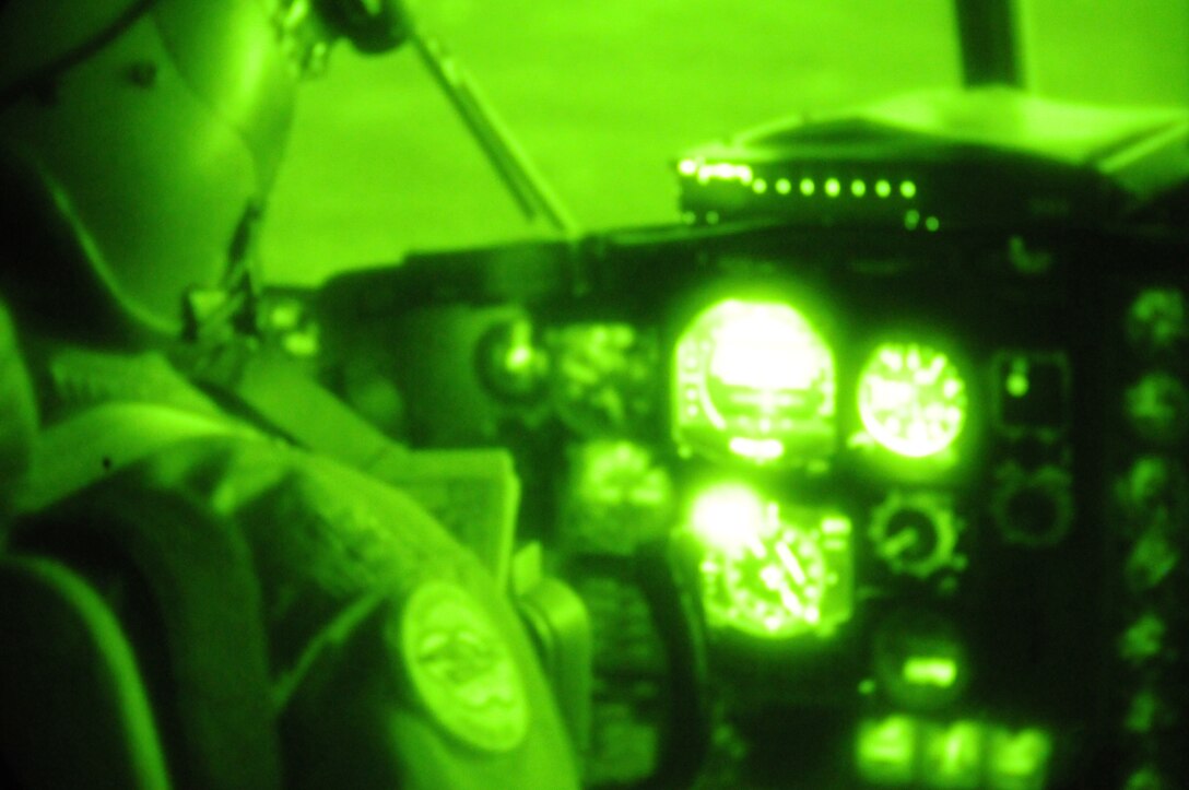 Lt. Col. Jeffery Langenfeld C-130 pilot for the 107th Airlift Wing, trains using the night vision goggles. Pilots from the Niagara Reserve Station fly local training mission for future deployments that may require night operations. (U.S. Air Force Photo/Senior Master Sgt. Ray Lloyd)