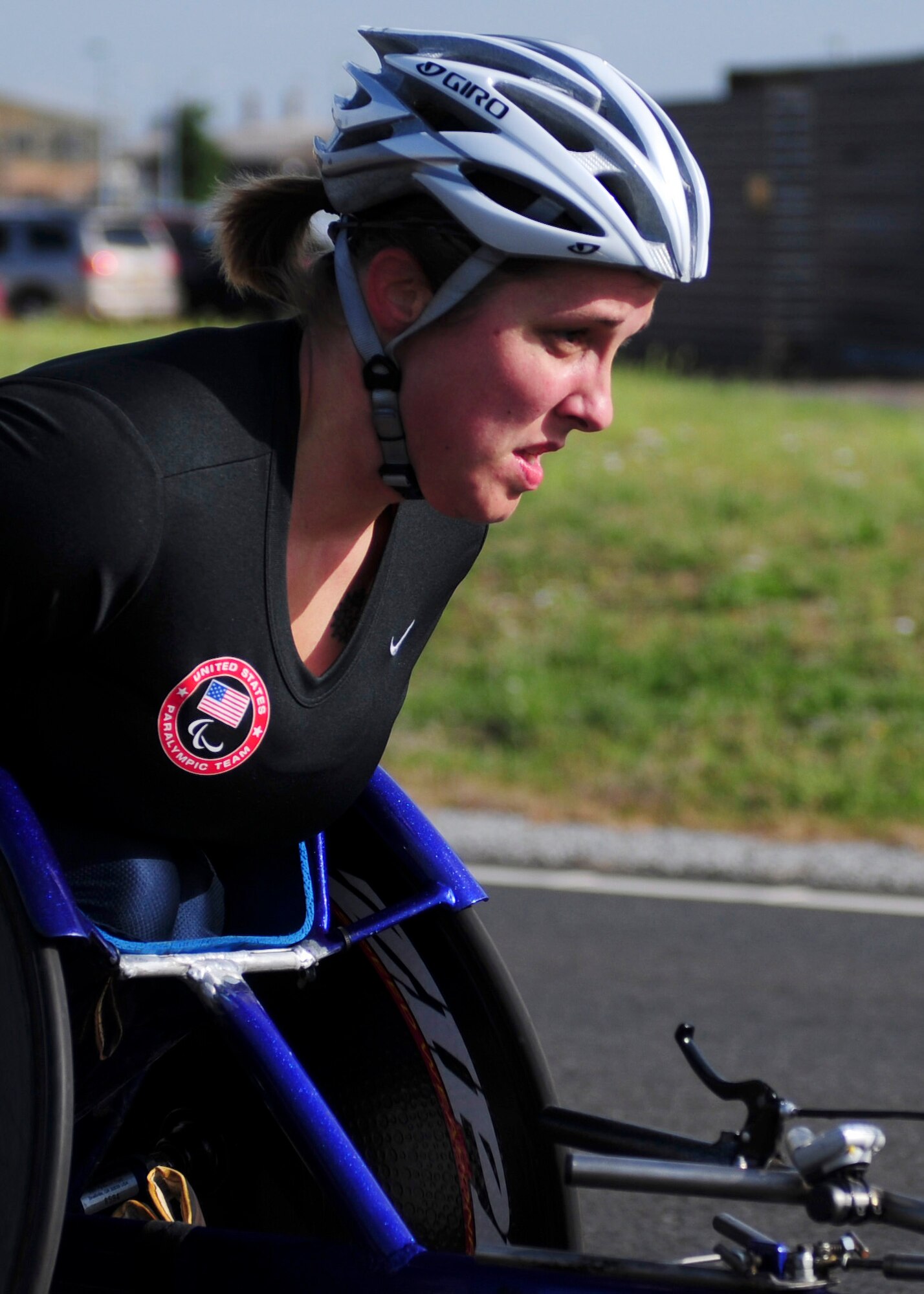 ROYAL AIR FORCE LAKENHEATH, England -- Christina Schwab, U.S. Paralympian, trains on the perimeter road Aug. 23, 2012. More than 50 U.S. Paralympians and hopefuls honed their skills and made final preparations here Aug. 18 through 25 for competition in the London 2012 Paralympic Games. (U.S. Air Force photo by Senior Airman Lausanne Morgan)