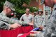 Air Force District of Washington Commander Maj. Gen. Sharon K.G. Dunbar, and her husband Doug, watch U.S. Air Force Honor Guard body bearers perform a flag folding ceremony during a tour of the honor guard compound Aug. 24 on Joint Base Anacostia-Bolling, Washington, D.C. The 11th Operations Group hosted an immersion tour for AFDW leadership, demonstrating the USAF Honor Guard and Band missions and capabilities. (U.S. Air Force photo by Senior Airman Steele C. G. Britton)