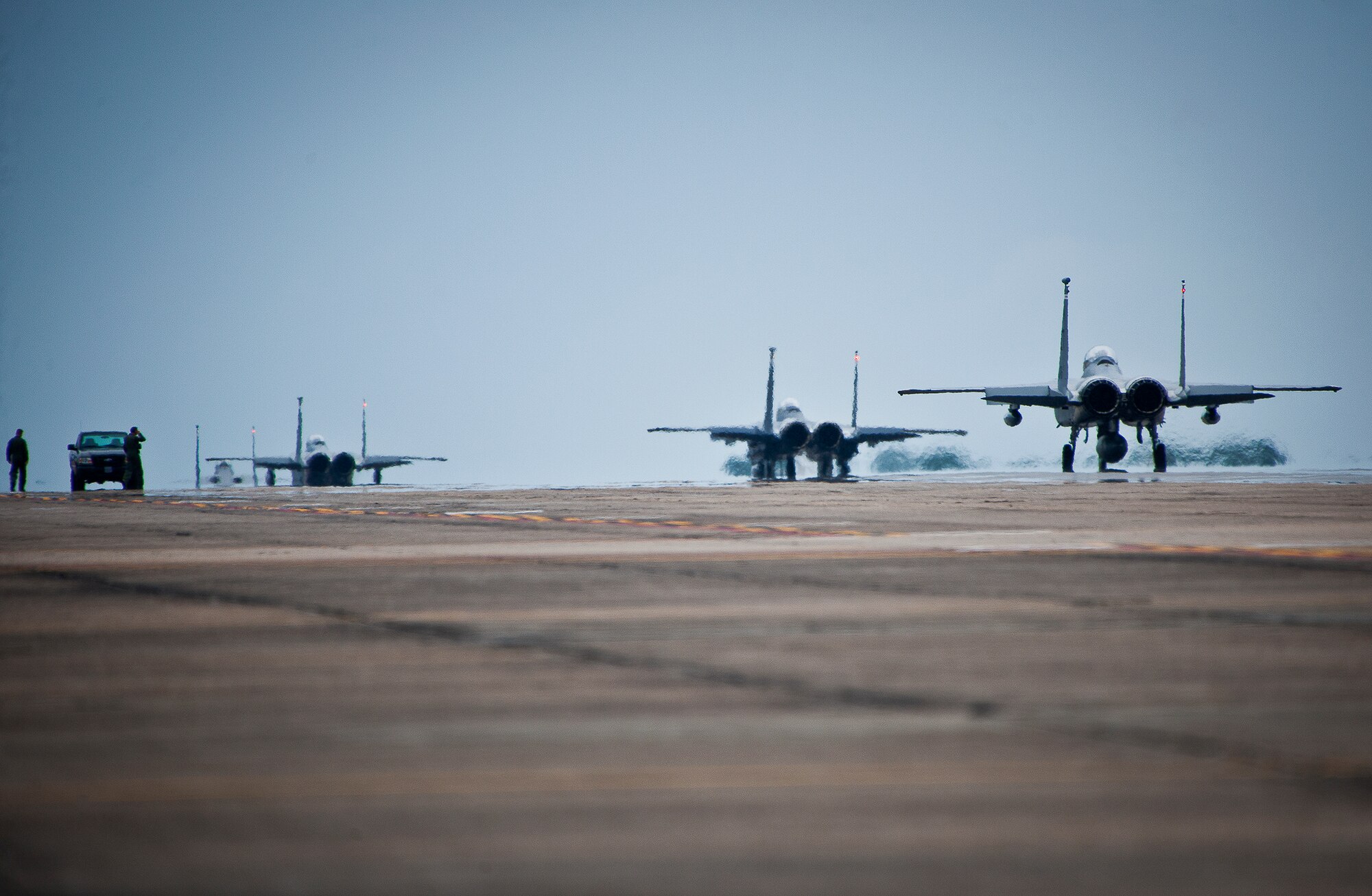 A four-ship of F-15s taxis toward the runway at Eglin Air Force Base, Fla., Aug. 27.  The 96th and the 53rd Wing evacuated their aircraft due to the impending arrival of Hurricane Isaac.  The Wings’ F-16s flew to Shaw Air Force Base, S.C., and the F-15s flew to Seymour Johnson Air Force Base, N.C.  (U.S. Air Force photo/Samuel King Jr.)  