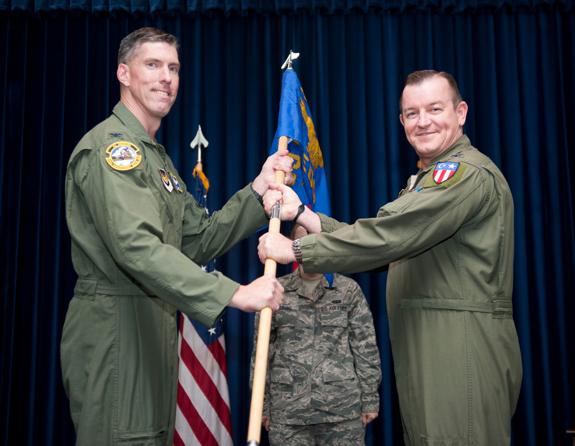 Col. Dana Hessheimer, outgoing 39th Expeditionary Operations Group commander, relinquishes command of the 39th EOG during a change of command ceremony Aug. 27, 2012, at Incirlik Air Base, Turkey. Lt. Col. Mark Hersant is the new 39th EOG commander. (U.S. Air Force photo by Senior Airman Clayton Lenhardt/Released)