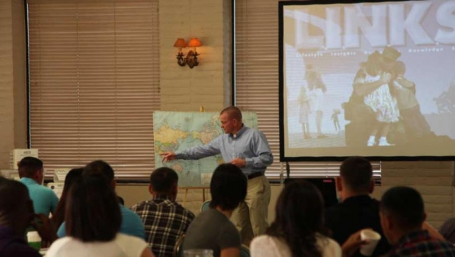 Lt. Col. Andrew Bergen, commanding officer of Combat Logistics Battalion 11, Combat Logistics Regiment 17, 1st Marine Logistics Group, talks to Marines and their spouses about the upcoming deployment with 11th Marine Expeditionary Unit during a L.I.N.K.S class at Camp Pendleton, Calif., April 29.