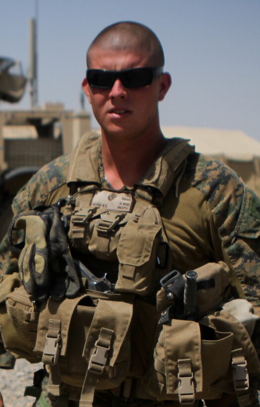 Lance Cpl. Ethan Payne, machine gunner, Weapons Company, 1st Battalion, 1st Marines, Regimental Combat Team 6, waits to load into his vehicle before a convoy, Aug. 28, 2012. Payne is proud of what he and his platoon have achieved while deployed to Trek Nawa, a known insurgent stronghold between the Nawa and Marjah districts, in Helmand Province, Afghanistan.