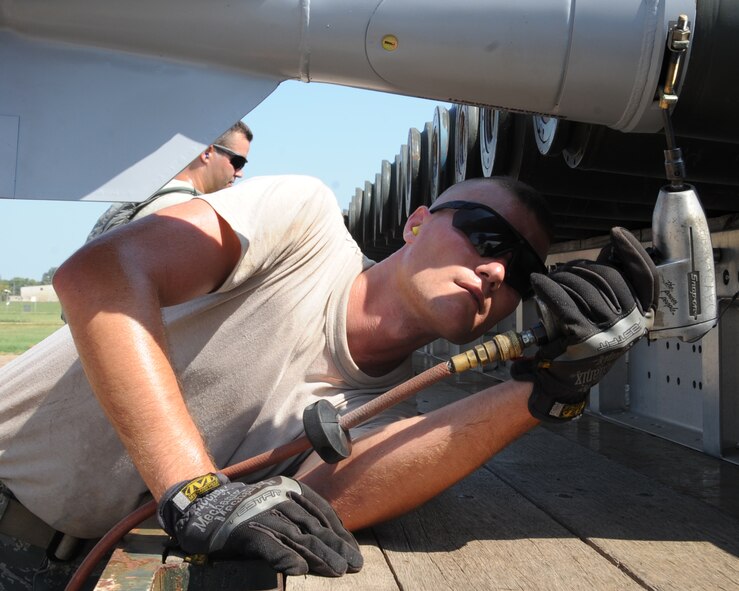 Airman 1st Class Gable Palmer, 2nd Munitions Squadron munitions maintenance team member, tightens down the fin of a MK-82 bomb during the 2012 annual Global Strike Challenge on Barksdale Air Force Base, La., Aug. 28. The 11-person team was evaluated in various areas of the build-up to include torque requirements, trailer loading procedures, technical order knowledge and safety procedures. (U.S. Air Force photo/Senior Airman Sean Martin)(RELEASED)