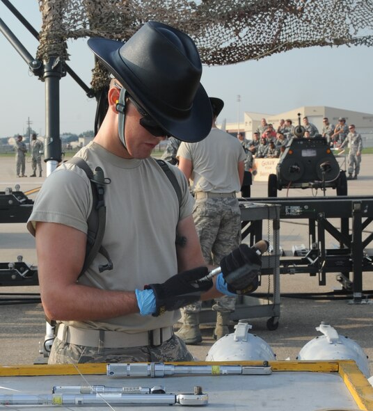 Airman 1st Class Nicholas Valdez, 2nd Munitions Squadron munitions maintenance team member, prepares his tools during the 2012 annual Global Strike Challenge on Barksdale Air Force Base, La., Aug. 28. The 11-person team will be competing against other bases within the command to defend their title as champions. (U.S. Air Force photo/Senior Airman Sean Martin)(RELEASED)