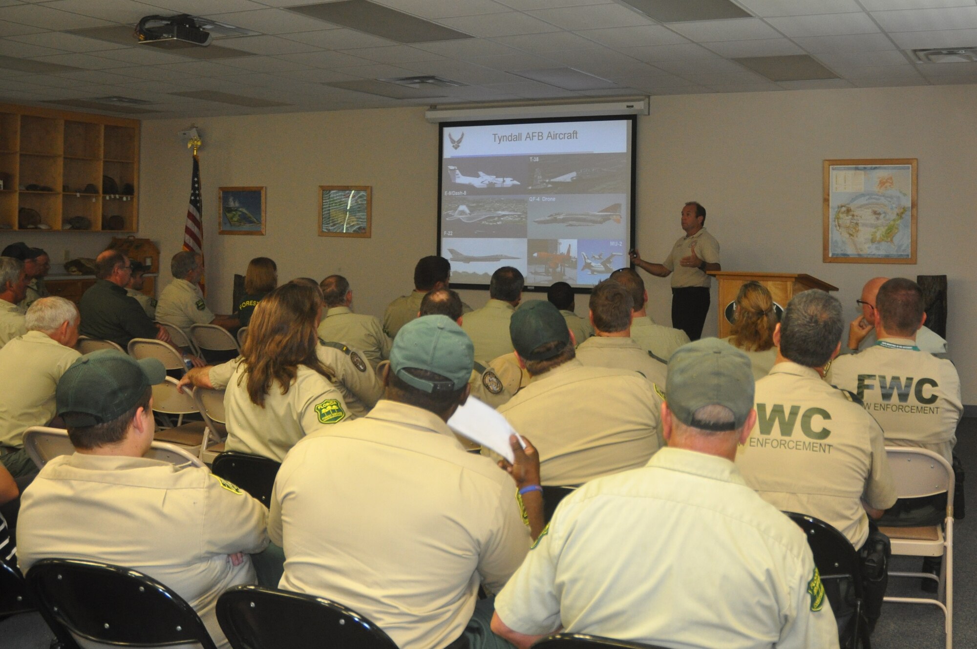 Bobby Richardson, 325th Civil Engineer Squadron assistant fire chief, briefs members of the Florida Forestry Service and Florida Fish and Wildlife Conservation Commission about the possible hazards of downed military aircraft at the annual Florida Forestry Service personnel meeting Aug. 16. (U.S. Air Force photo by 2nd Lt. Andrea Valencia)

