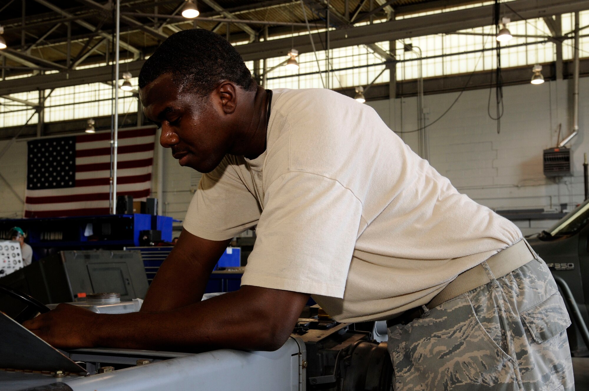 Senior Airman Daniel Dotson, 2nd Maintenance Squadron aerospace ground equipment flight, changes a fuel injector on a MHU 83 D/E model bomb lift on Barksdale Air Force Base, La., Aug 28. The AGE flight maintains equipment and tools required to assist aircraft take-off. (U.S. Air Force photo/Airman 1st Class Andrew Moua)(RELEASED)