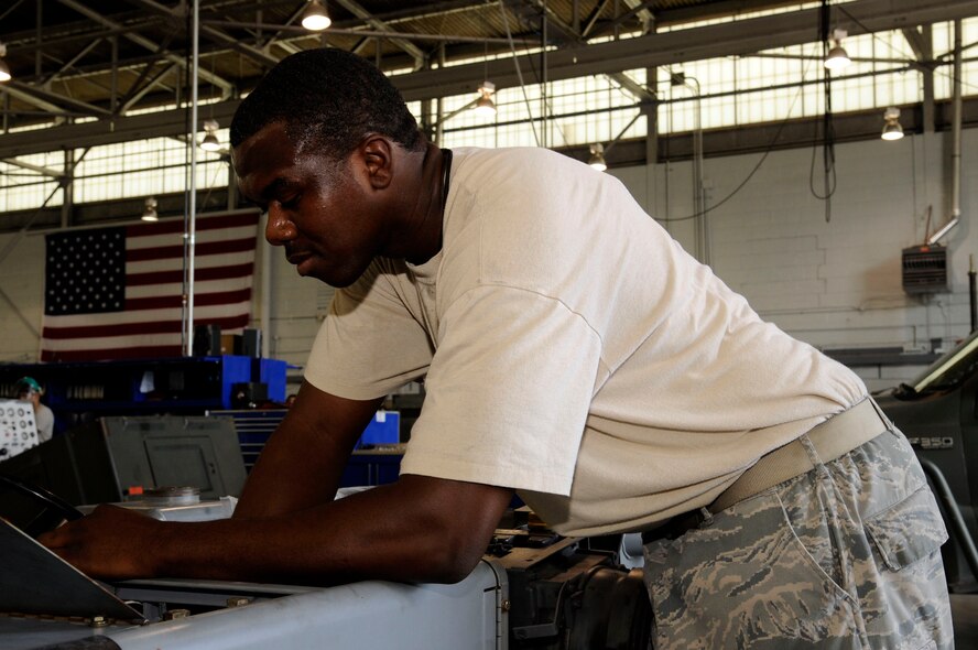 Senior Airman Daniel Dotson, 2nd Maintenance Squadron aerospace ground equipment flight, changes a fuel injector on a MHU 83 D/E model bomb lift on Barksdale Air Force Base, La., Aug 28. The AGE flight maintains equipment and tools required to assist aircraft take-off. (U.S. Air Force photo/Airman 1st Class Andrew Moua)(RELEASED)